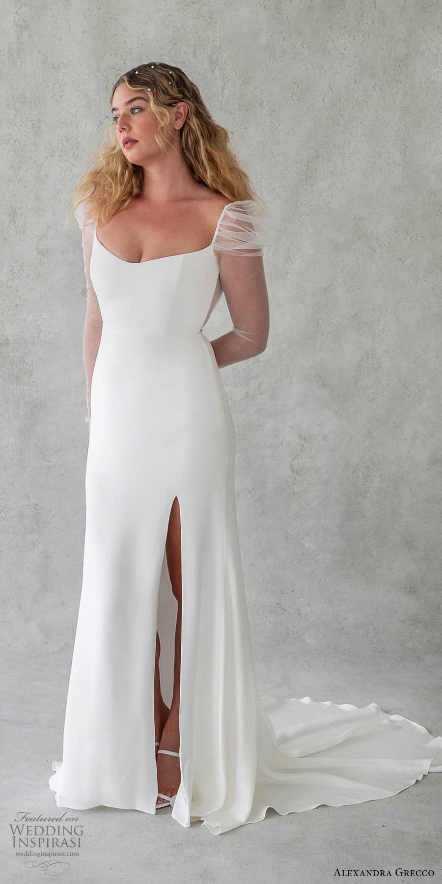 alexandra grecco 2024 bridal sheer long puff sleeve semi scoop neckline clean minimalist sheath a line wedding dress slit skirt (7) mv