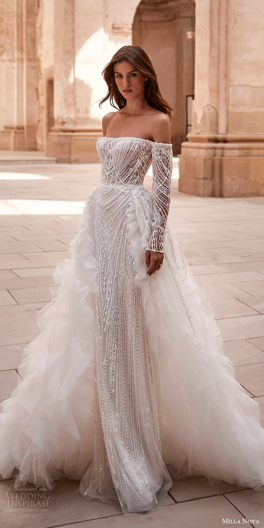 milla nova 2024 couture bridal off shoulder long sleeve straight across neckline heavily embellished sheath wedding dress a line overskirt chapel train (1) mv